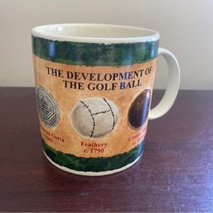 Papel Giftware “The Development of the Golf Ball” mug